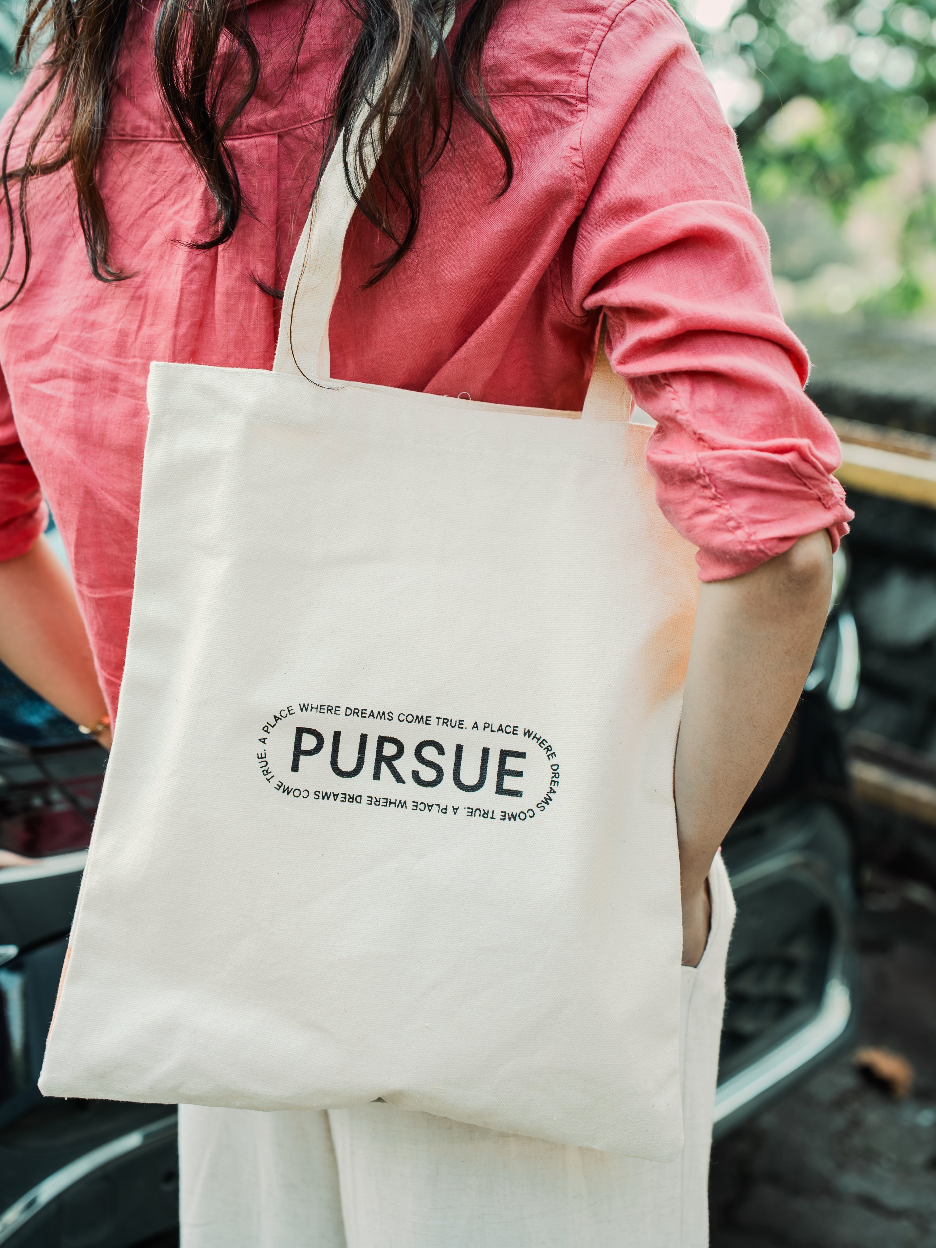 The Pursue Tote Bag